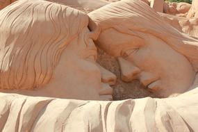 beautiful sand figure faces