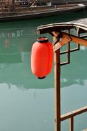 red lamp by the lake
