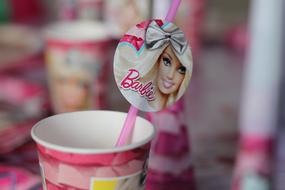 pink tube in a glass