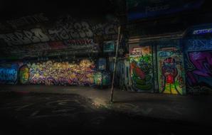graffiti on the walls of houses on the street
