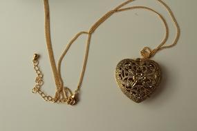 gold pendant with heart
