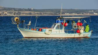 fishing boat in the blue sea