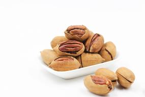 delicious peanuts on a white background
