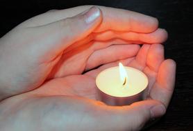 candle in hand