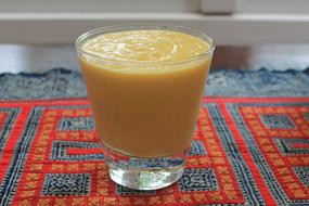 delicious juice in a glass on the table