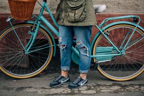 man near a bicycle on the street