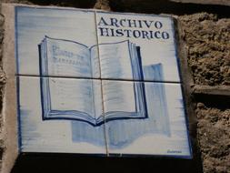 sign on the stone building