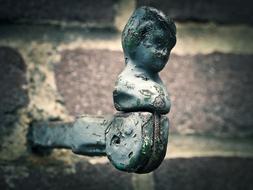 metal holder with figure
