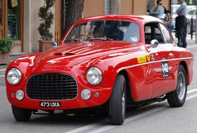 red sports car on the street