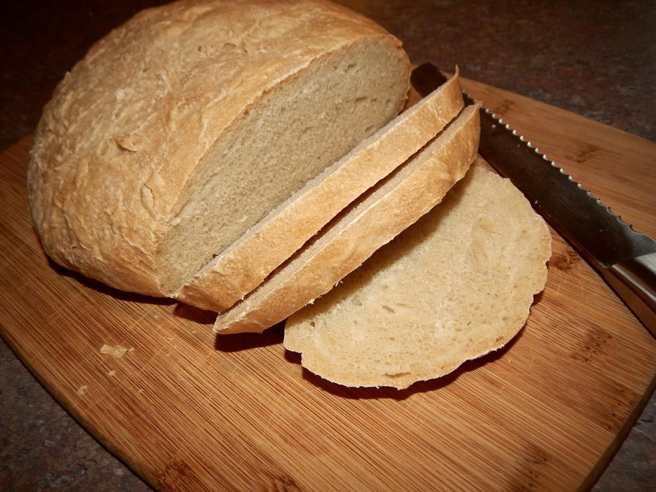 sliced delicious bread with a knife