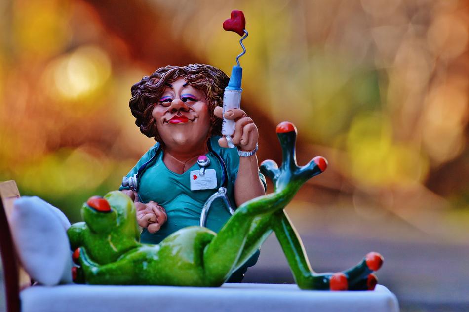 Funny figure of a nurse and a frog