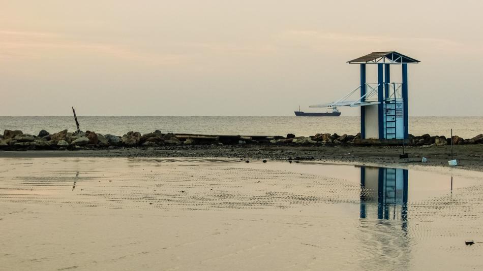 watchtower on beach early at morning, Cyprus, Larnaca