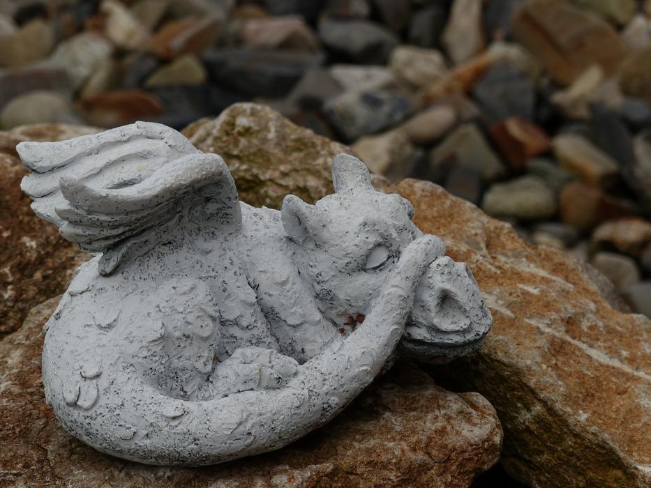 sleeping stone dragon figure