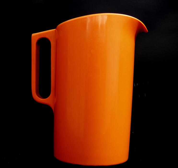 orange vase on a black background