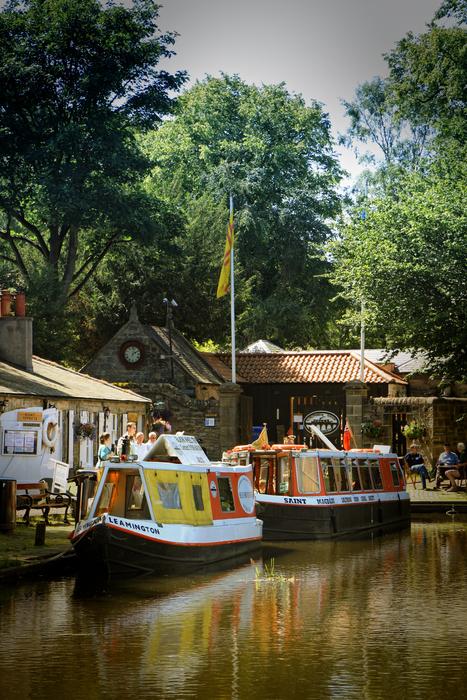 boats near the cafe by the river