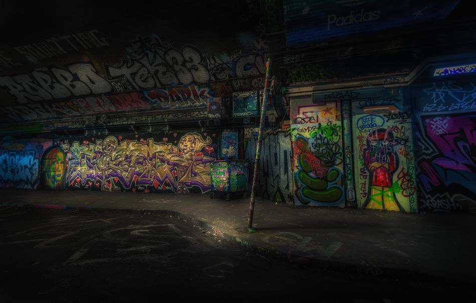 graffiti on the walls of houses on the street
