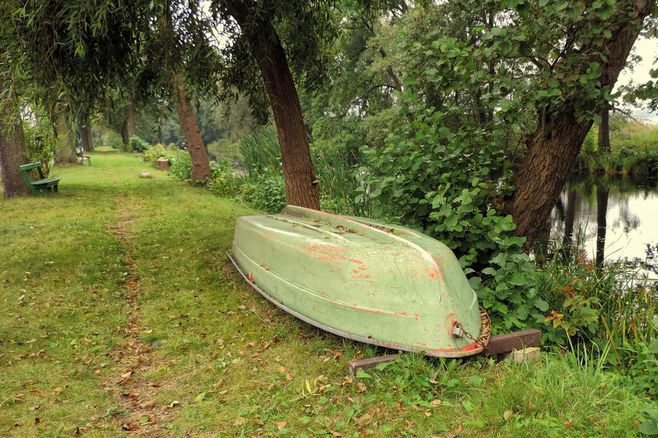 overturned rowboat on the shore