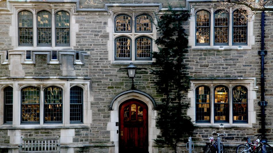 Beautiful university of the 'Ivy League' with the green ivy plants and lights