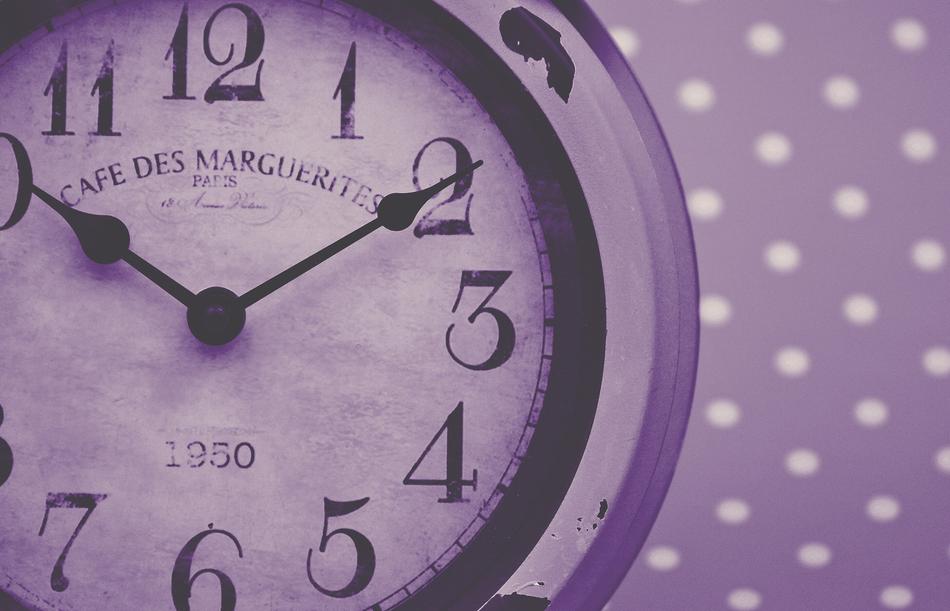 clock on purple background