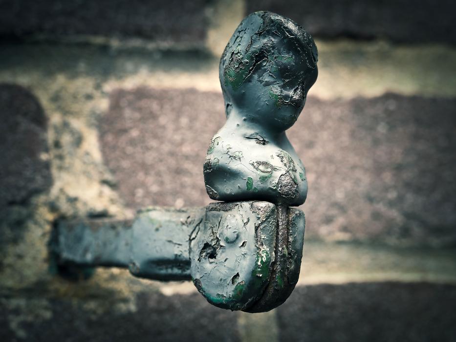 metal holder with figure