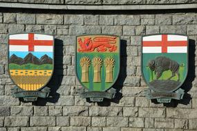 colored coats of arms on the wall