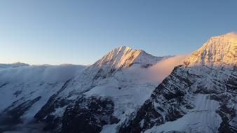 white snow Sunrise Mountains