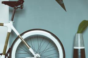 bicycle wheel on blue background