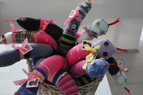 fabric toys in a basket