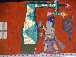 aztec mural on the wall