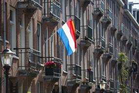 flag on the window of the building