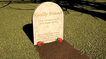 tombstone decorated with roses