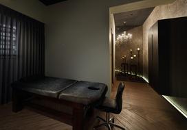 cosmetology room with leather sofa