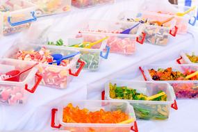 colored candies in a plastic box