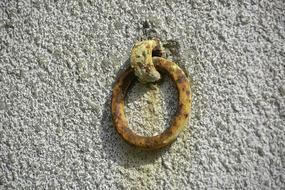 rusty ring on the wall