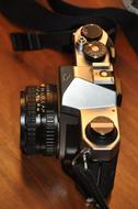 ld camera on a wooden table