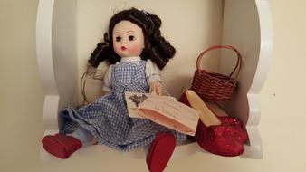 cute doll on the chair