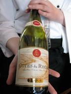 waiter with bottle of wine