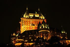 luminous hotel castle in the night