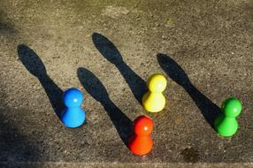 colored buttons in the ground