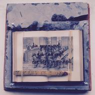inscription on the small photo