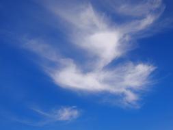 cozy white clouds on a blue background