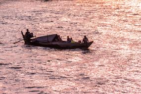 people vacationing on a boat at sea