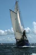 big sail on a boat at sea