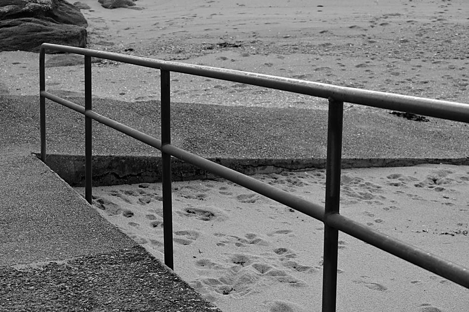 white snow on the railing