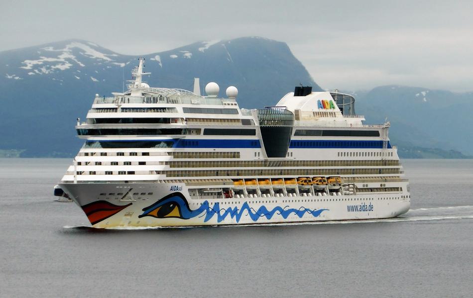 a ship sailing out to sea