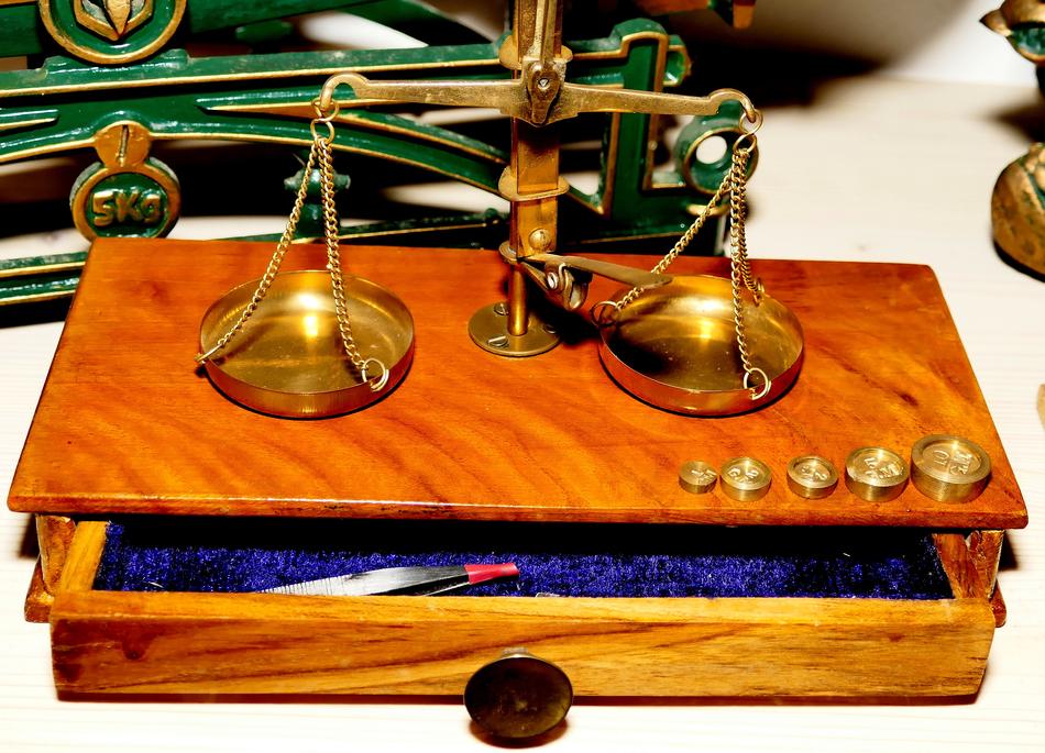 wooden box with scales of justice