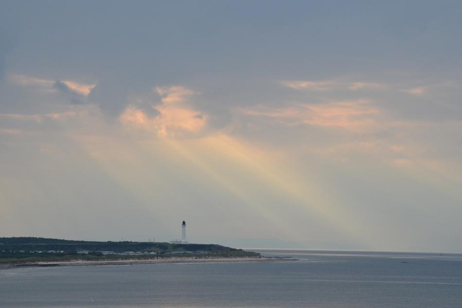 rays of sunshine in the clouds