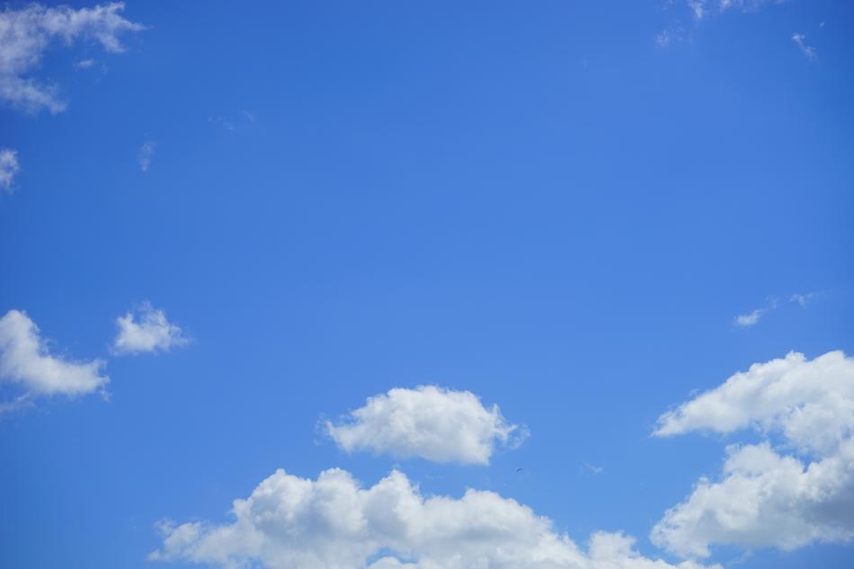 Summer Clouds white clouds in the clear sky