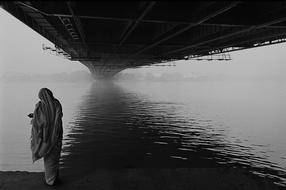 girl in a scarf by the river