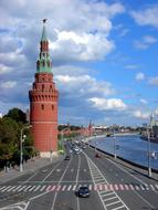 red square tower by the road